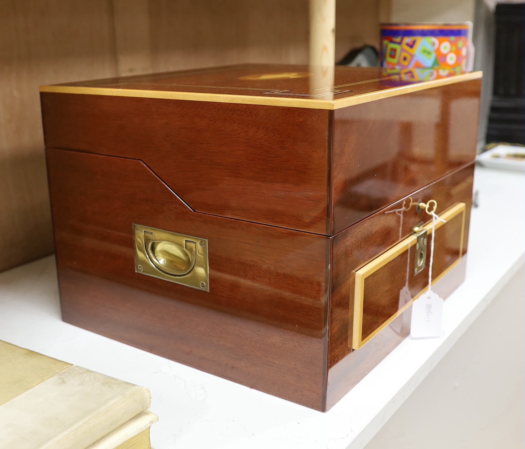 An inlaid travelling decanter box, with lower drawer and a set of Royal Doulton glasses